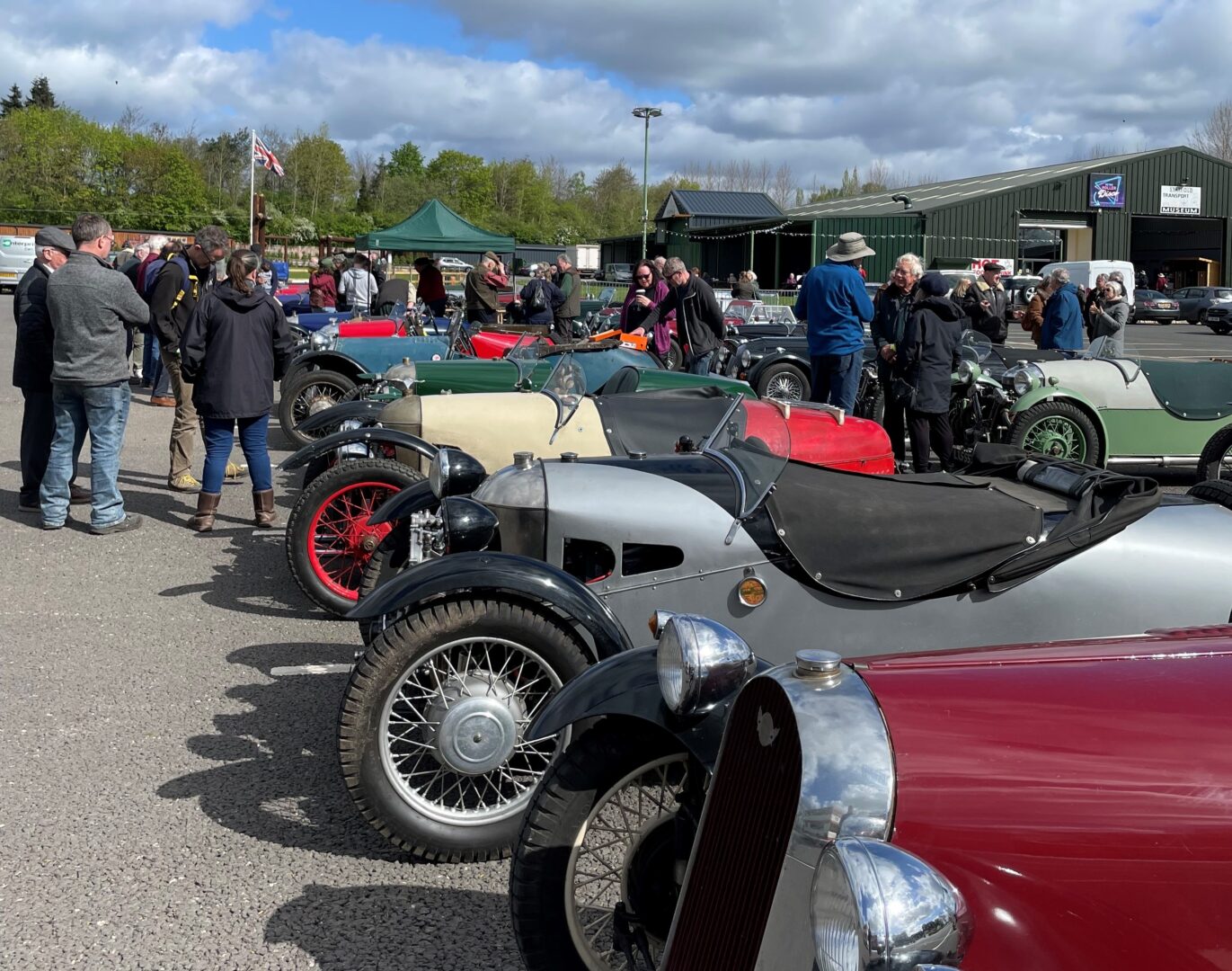 A group of car enthusiasts at the Morgan Three Wheeler Club Opening Run.